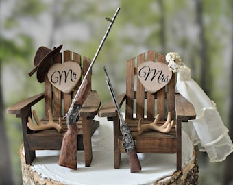 Hunting themed wedding cake topper bride groom hunters shotguns rifle antler rack Adirondack chairs camping fishing camouflage deer hunter