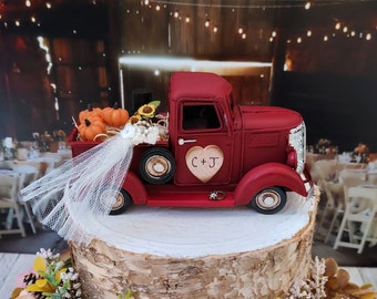 pickup truck wedding cake topper old fashioned truck vintage style red fall themed pumpkin rustic barn hay bale sunflower country wedding