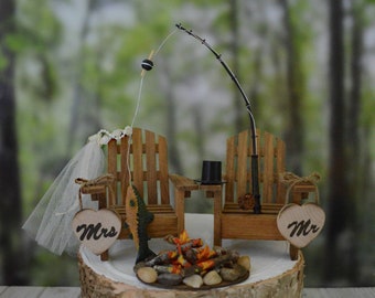 Fishing themed wedding cake topper for rustic country weddings bride and groom fisherman fishing poles Adirondack chairs campfire camping