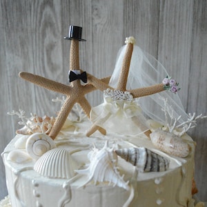 starfish wedding cake topper decorated ivory veil destination wedding bride and groom pencil starfish Mr and Mrs beach weddings beach themed