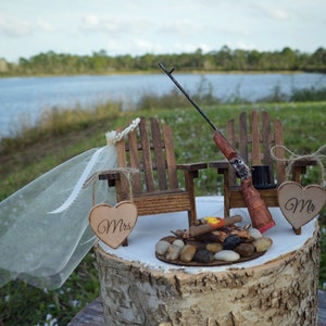 Country-wedding-cake topper-western-hunting-shot gun-riffle-gun-Adirondack-chair-hunter-hunting groom-groom's cake-deer hunter-camouflage