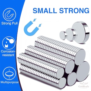 May include: A collection of silver-colored circular disc magnets arranged in stacked columns. The image features the text SMALL STRONG, Strong Pull, Corrosion-resistant, and Multipurpose, along with icons of a magnet and a drop.