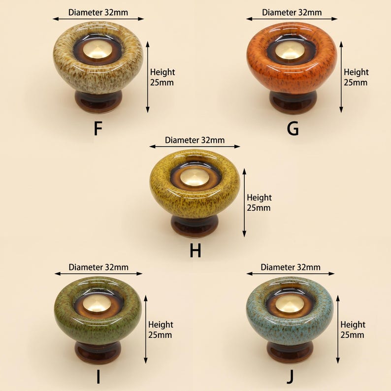May include: Five round ceramic cabinet knobs labeled F, G, H, I, and J. Each knob features a glossy, speckled glaze in beige, orange, yellow, green, or teal, with a central gold-tone metal disc. Each knob measures 32mm in diameter and 25mm in height.
