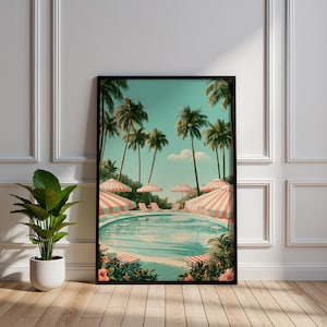 May include: A framed wall art print depicting a swimming pool surrounded by palm trees, lounge chairs, and pink and white striped umbrellas under a clear sky. The scene features lush tropical foliage and vibrant floral accents.
