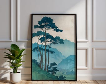 Puede incluir: Lámina artística enmarcada que representa un paisaje sereno con árboles y montañas estilizados. La obra de arte muestra una paleta de azules y verdes, con un enfoque en las formas naturales de los árboles y la cordillera en capas en el fondo. La impresión está en un marco negro.