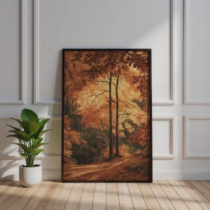 Può includere: Una stampa artistica da parete rettangolare incorniciata che raffigura un paesaggio boschivo in autunno. La scena mostra alberi alti con fogliame arancione e dorato vibrante, un sentiero sterrato che si snoda tra i boschi e ombre profonde.