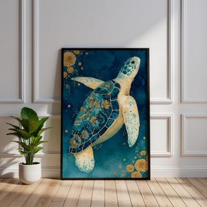 May include: A framed wall art print featuring a sea turtle with a deep blue and cream patterned shell, accented with gold floral motifs. The turtle is depicted swimming against a dark blue watercolour background with scattered gold flower illustrations.