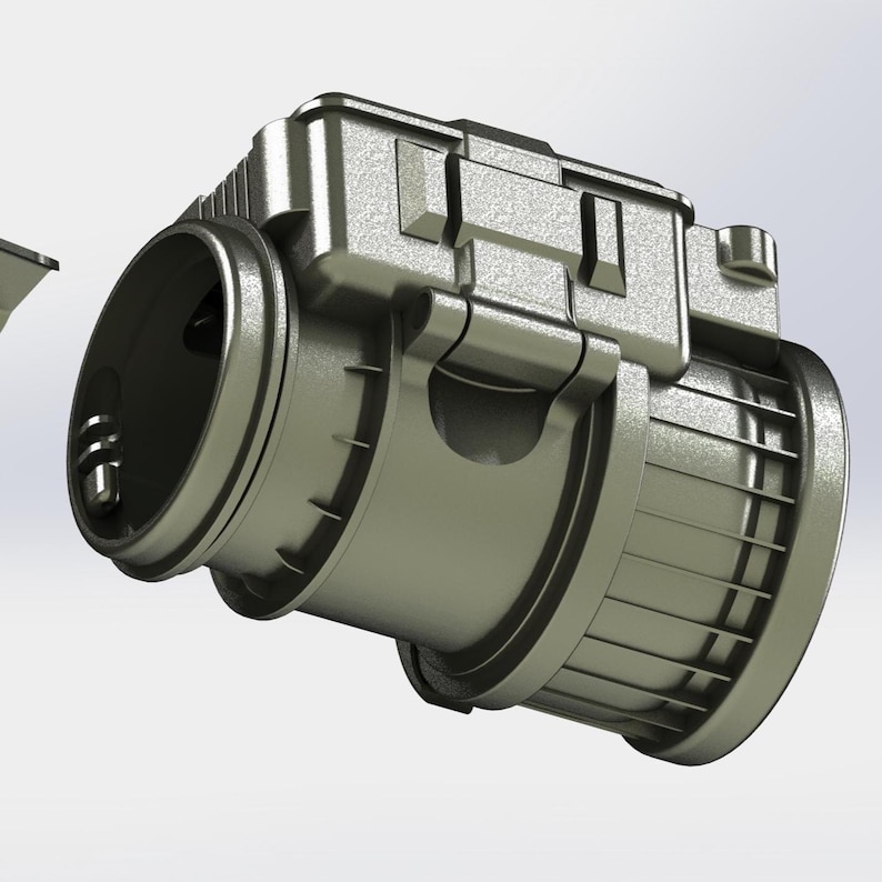 May include: A metallic gray, industrial-style component with a cylindrical body and a rectangular top section. The design features multiple ridges and a hinged element, suggesting a mechanical or engineering application. The object is set against a plain white background.