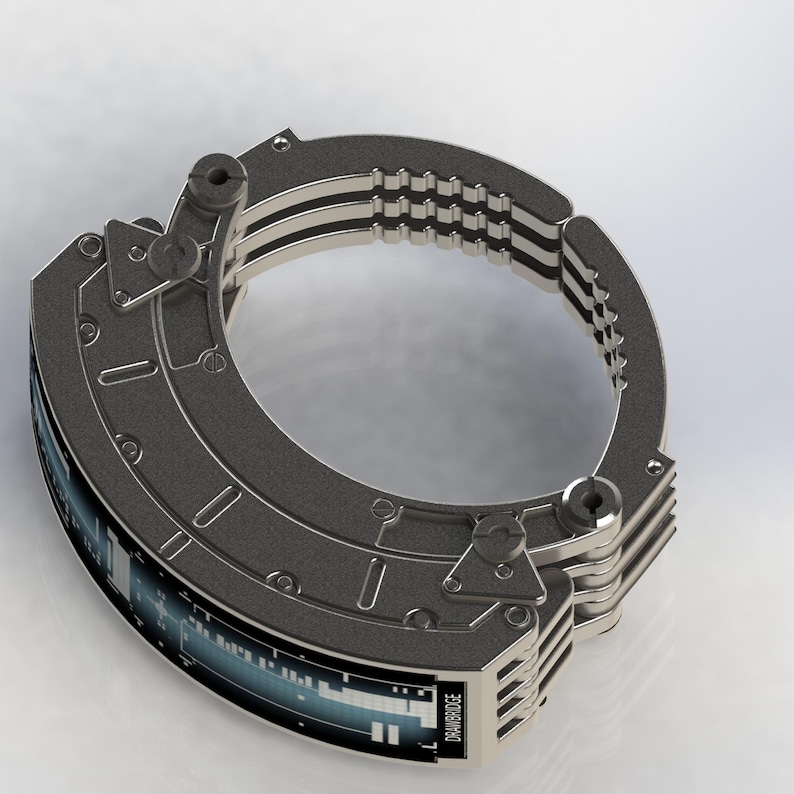 May include: A futuristic, silver-toned bracelet with a digital display. The bracelet features a complex, layered design with visible screws and a segmented structure. The display shows a blue and white graphic, and the word "DRAWBRIDGE" is visible.