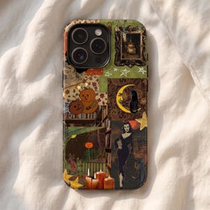 May include: A smartphone case featuring a collage of illustrations including a framed frog, a crescent moon with a black cat, pumpkins, a woman in a black dress, and lit candles. The design incorporates various shades of green, brown, and orange.