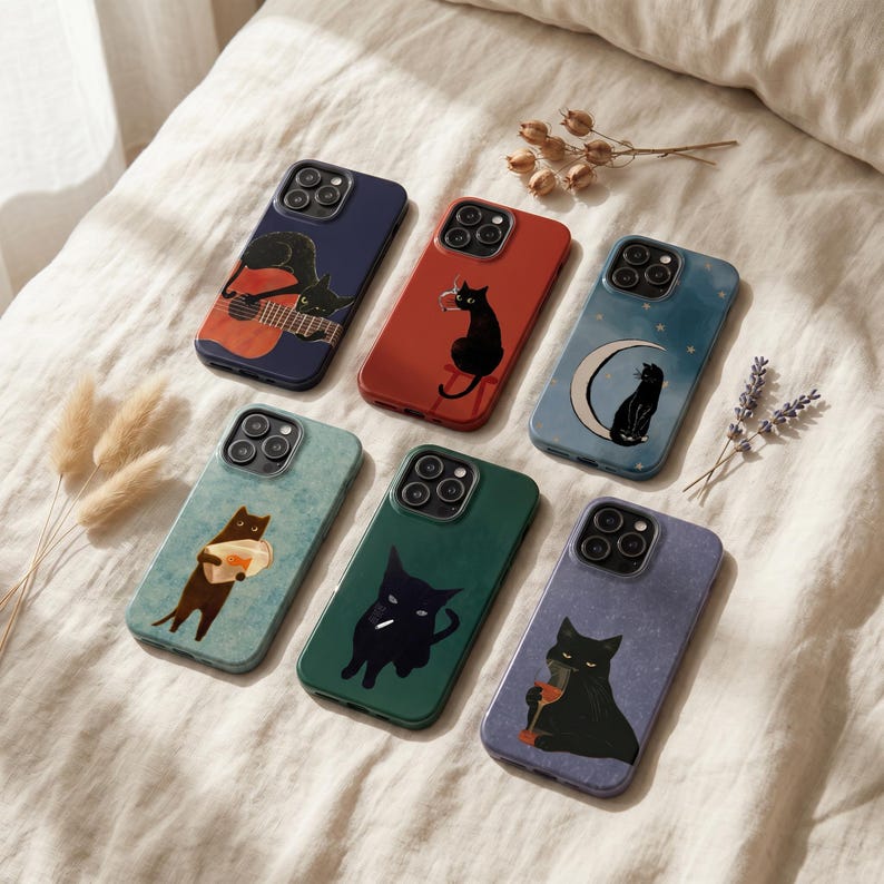 May include: Six smartphone cases featuring black cat illustrations. One shows a cat playing guitar, one a cat with a cigarette, one a cat on a crescent moon, one a cat holding a loaf of bread, one a cat with a cigarette, and one a cat with a wine glass.