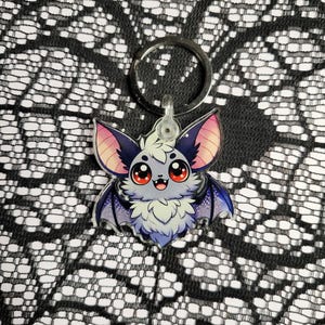 Enchanted Night Bat Keychain - Gothic Charm Accessory with Vibrant Wings, Perfect for Halloween Enthusiasts and Gothic Decor Admirers