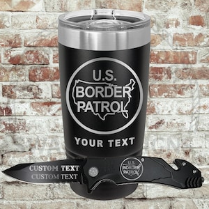 May include: Black tumbler with a silver rim and lid, featuring a white graphic of the U.S. map and the words "U.S. Border Patrol." Below the graphic is the text "YOUR TEXT." A black pocket knife with "CUSTOM TEXT" is also in the image.