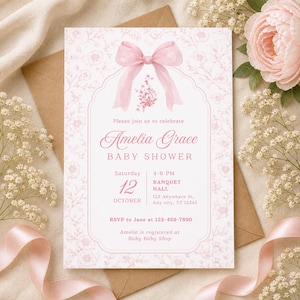 May include: A baby shower invitation with a pink floral design and a pink bow. The invitation reads "Amelia Grace BABY SHOWER" with event details. RSVP information is included.