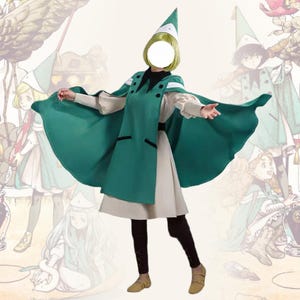 May include: A costume featuring a green cape with black buttons and a matching pointed hat, worn over a beige long-sleeved dress and dark leggings. The outfit includes a light green wig and tan shoes, presented against a background illustration.