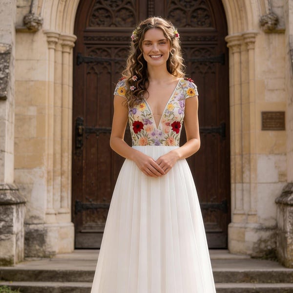 Vestido bohemio de gasa con bordado floral, escote en V profundo y espalda abierta