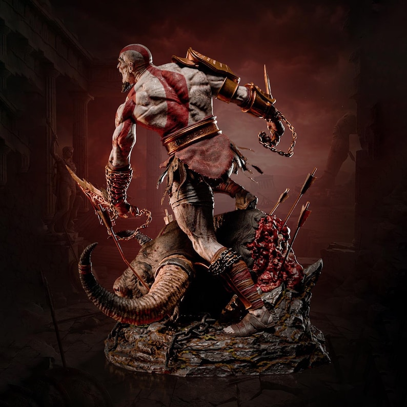 May include: A detailed figurine of a muscular, pale-skinned warrior with a prominent red tattoo across the back, wearing gold arm guards and a brown loincloth, standing atop a dark, textured base with a large creature and several arrows.