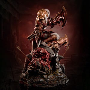 May include: A detailed collectible statue of a warrior figure with pale skin, wearing gold shoulder armour and brown wraps, wielding two glowing red-bladed curved swords. The figure stands atop a dark, rocky base embedded with arrows.