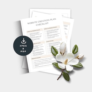 May include: A white paper titled "WEBSITE CREATION PLAN CHECKLIST" with checkboxes. A black circle with "JPEG & PDF" text and a download icon is on the left. A white magnolia flower with green leaves is on the right.
