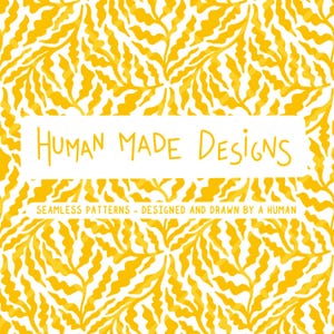 May include: A repeating pattern of yellow leaf-like shapes on a white background. The text "HUMAN MADE DESIGNS" is in a white rectangle, with the text "SEAMLESS PATTERNS - DESIGNED AND DRAWN BY A HUMAN" below it.