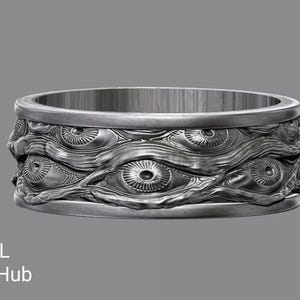 May include: A white ceramic mug with a black handle and the text "But First, Coffee" in a black, bold font. The mug is on a white surface.