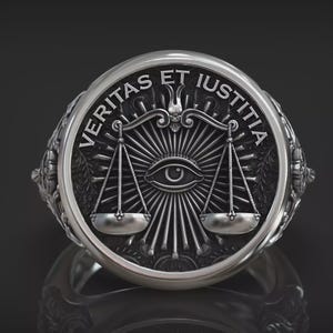 May include: A white ceramic mug with a black handle and the text "But First, Coffee" in a handwritten style. The mug is on a white surface. The mug is 4 inches tall.