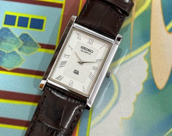 Vintage Seiko Slim Tank Quarz, weiße Herrenarmbanduhr mit römischem Zifferblatt