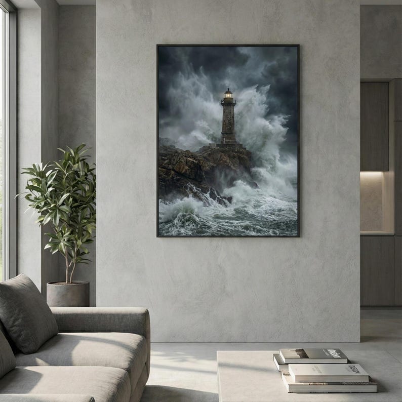 May include: A framed print of a lighthouse on a rocky coast, battling a stormy sea. The lighthouse is gray and white, with a light at the top. The waves are crashing against the rocks, creating a dramatic scene. The sky is dark and cloudy.