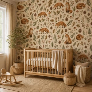 May include: A light wood crib with a beige blanket, positioned against wallpaper featuring a repeating pattern of foxes, pinecones, ferns, and mushrooms. A wooden rocking horse, two woven baskets, and a beige throw blanket are nearby.