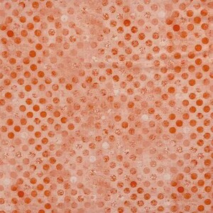 May include: A fabric featuring a repeating pattern of solid orange circles arranged in a grid on a light peach background. The surface has a textured appearance with subtle variations in color density throughout the material design.