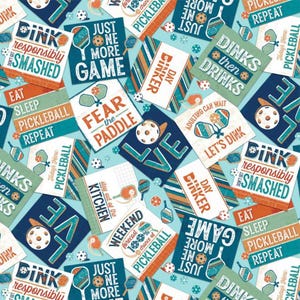 Peut inclure: Un motif coloré de carrés turquoise, orange et blanc avec du texte sur le pickleball. Le texte comprend des phrases comme "Dink Responsibly", "Fear the Paddle", et "Just One More Game".