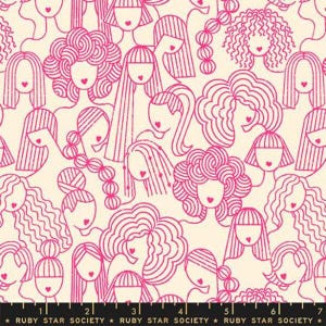 May include: A fabric pattern featuring a repeating design of stylized women's faces in bright pink on a cream background. Each face has a heart-shaped mouth. The hair styles vary, including curly, straight, and braided styles. The text "RUBY STAR SOCIETY" is at the bottom.