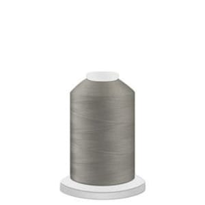 May include: A spool of gray sewing thread.