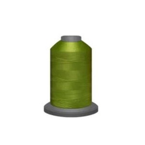May include: A spool of bright green thread.