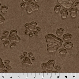 May include: Brown fabric with a repeating pattern of embossed paw prints.