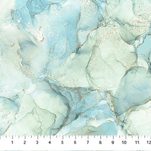 May include: A fabric featuring an abstract alcohol ink pattern in shades of light blue, sage green, and white, accented with thin gold veins and speckles. A white ruler with black markings is visible at the bottom, measuring up to 30 centimetres.