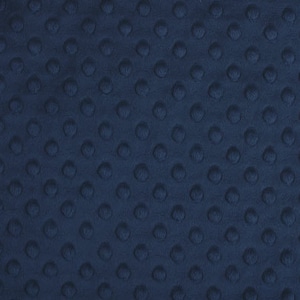 May include: A close-up of a dark blue fabric with a textured pattern of small, raised circles.