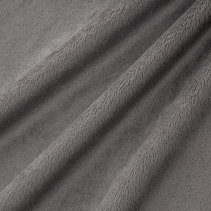 May include: Close-up of a soft, gray fabric with a fuzzy texture. The fabric is folded and has a subtle sheen.