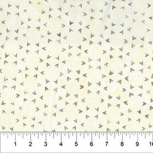 May include: Cream-colored fabric with a repeating pattern of small, gray arrow shapes. The arrows are arranged in a scattered, yet organized, design across the fabric. A ruler is visible along the bottom edge, marked in inches.