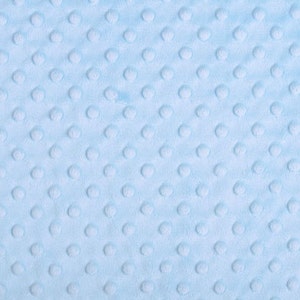 May include: A close-up of a light blue fabric with a textured pattern of small raised dots.