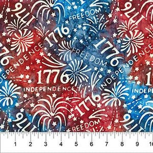 May include: Fabric with a patriotic design featuring the number "1776", fireworks, and the words "Freedom" and "Independence" in white against a red and blue watercolor background. A ruler is at the bottom, showing inches.