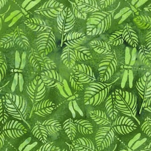 May include: A fabric featuring a repeating pattern of light green leaves and dragonflies set against a darker green, mottled background. The design displays a batik-style aesthetic with varying shades of green creating a textured, layered appearance.