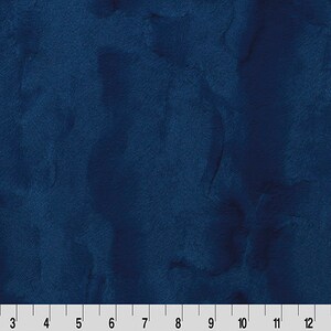 May include: A solid blue fabric with a subtle marbled texture. The fabric has a smooth, even surface and a deep, rich blue color.