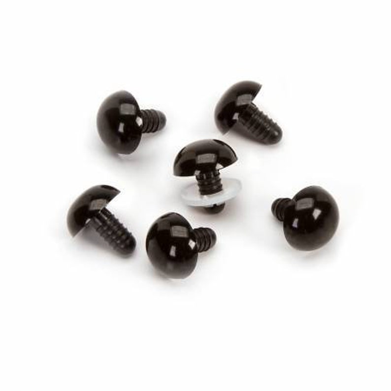 May include: Six black plastic safety eyes with a washer and screw back. The eyes are approximately 1/2 inch in diameter.