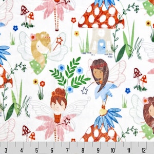 May include: A white fabric with a repeating pattern of fairies, mushrooms, and flowers. The fairies are wearing colorful dresses and have wings. The mushrooms are red with white spots and have a house-like shape. The flowers are in various colors, including pink, yellow, and blue.