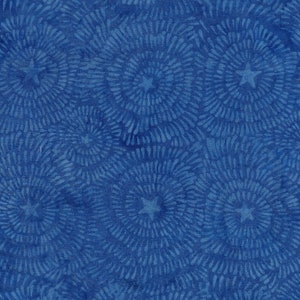 May include: A seamless pattern of blue and white stars in a circular design on a blue background.