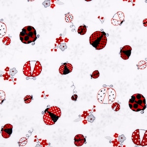 May include: White fabric with a repeating pattern of red and black ladybugs with white polka dots. The ladybugs are scattered randomly on the fabric.
