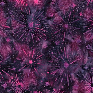 May include: A fabric featuring a batik-style pattern with vibrant magenta and pink starbursts and small stars scattered across a dark purple and black mottled background. The design creates a celestial effect with radiating lines and dots.