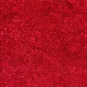 May include: A deep red fabric featuring a mottled, batik-style texture with a dense pattern of small, irregular light red and pink dots scattered across the surface, creating a subtle, layered appearance with varying shades of crimson and scarlet.