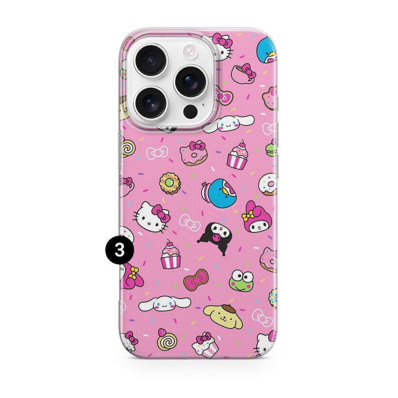 May include: Pink phone case featuring a repeating pattern of cartoon characters, cupcakes, donuts, and bows. The case has a clear border and a camera cutout. The design includes characters like Hello Kitty and My Melody.